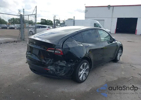 2023 Tesla Model Y Awd/Long Range Dual Motor All-Wheel Drive z USA, uszkodzony, nr VIN 7SAYGDEE2PA044328